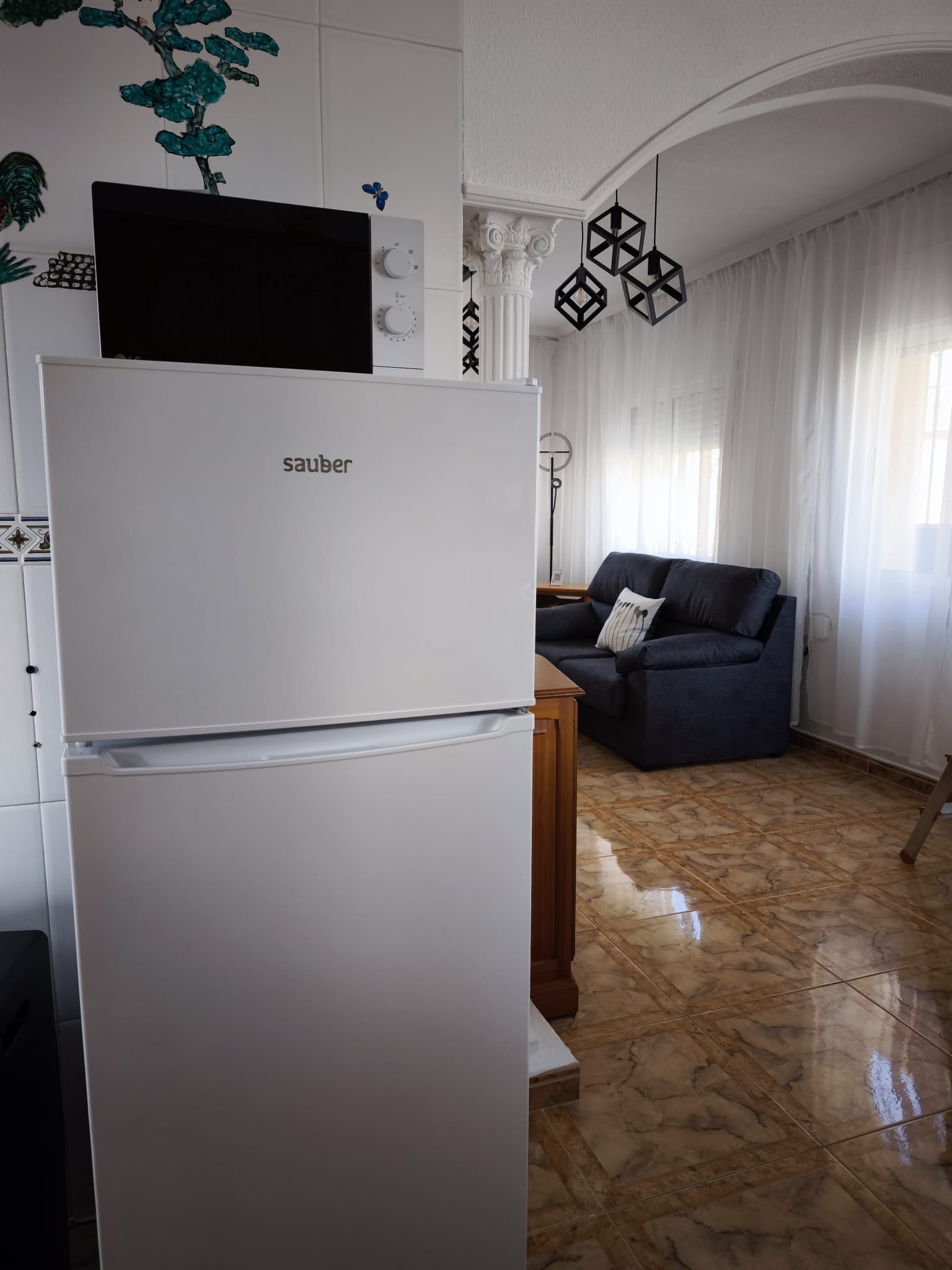 Kitchen fridge/freezer with microwave