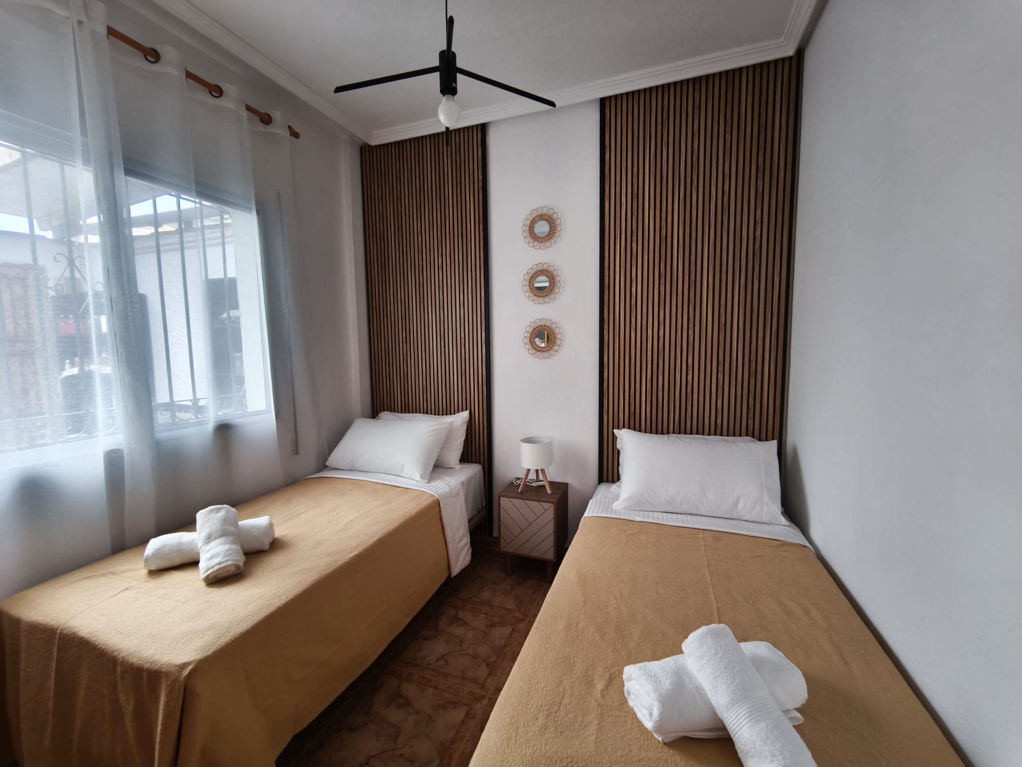 Bright twin room with modern decor