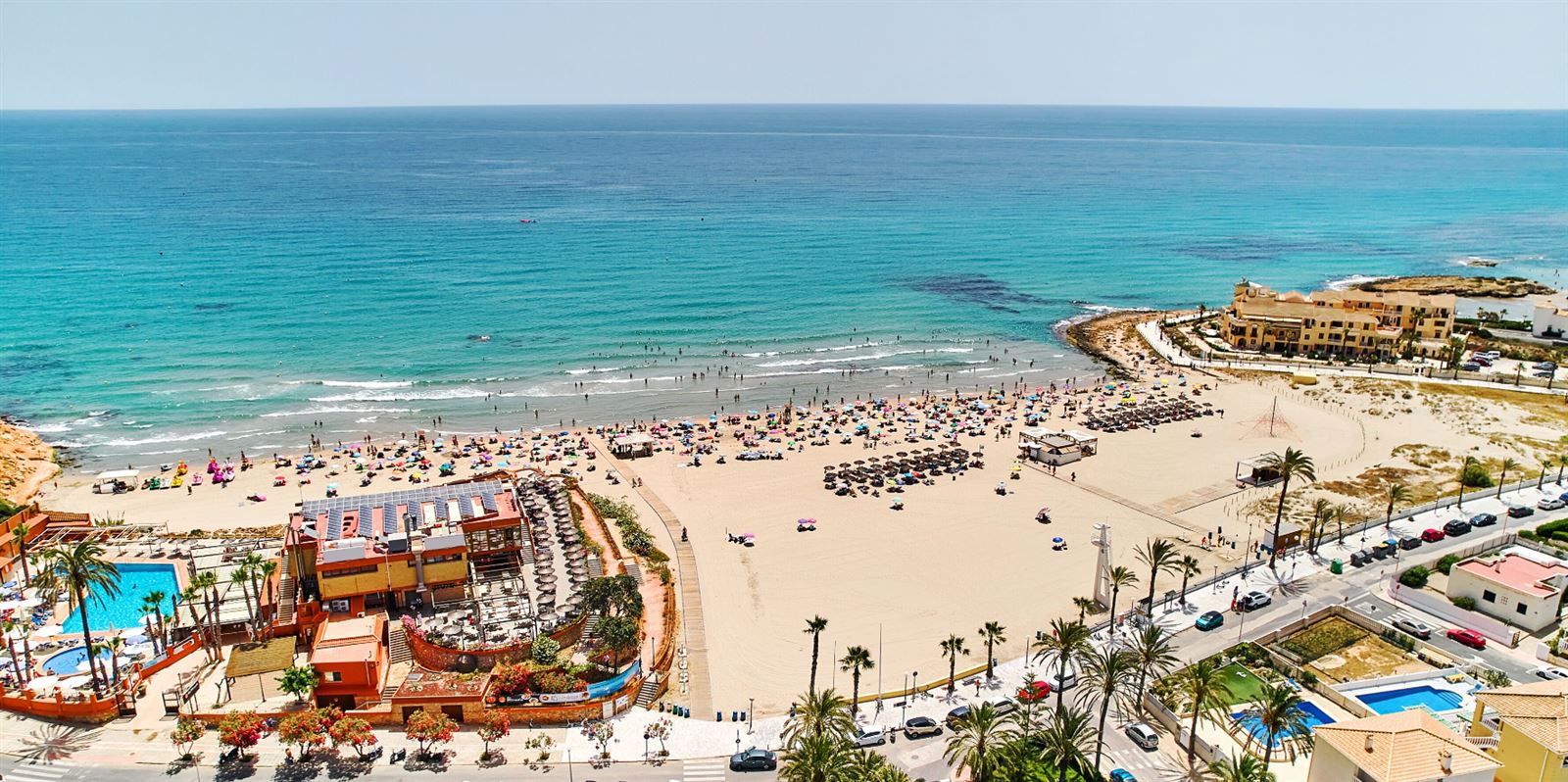 La Zenia Beach with crystal-clear turquoise waters and golden sand